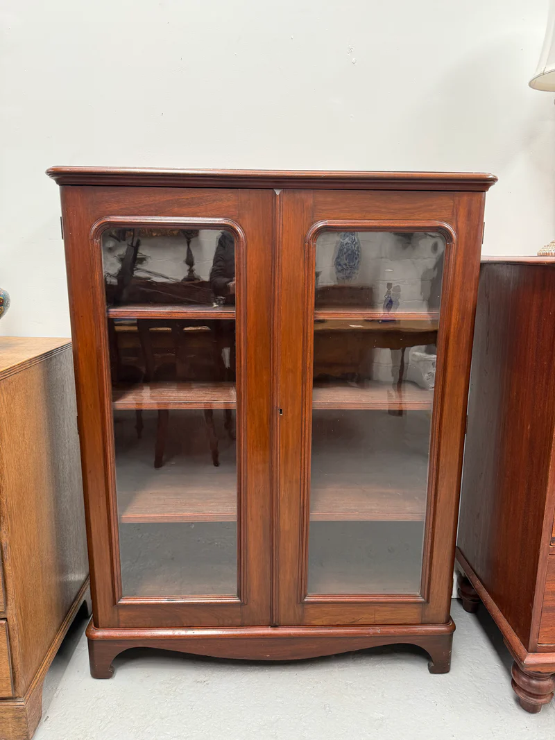 Vintage Bookshelves with Glass Doors: Where Old Meets Gold