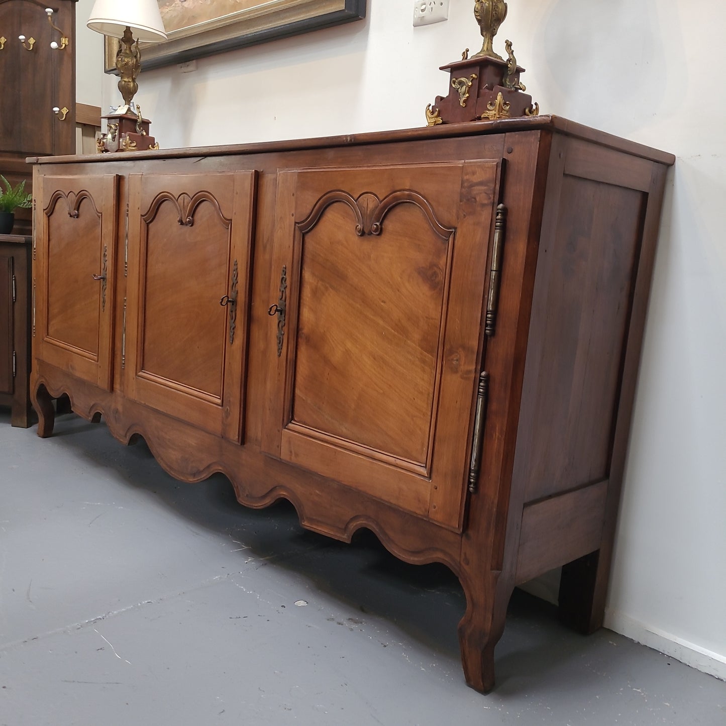 Early 19th Century Fruitwood Three Door Sideboard