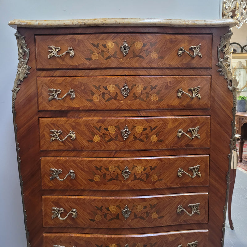 An amazing 1930's Louis XV style walnut and kingwood marquetry inlaid marble top semainier chest with seven generous sized drawers. This beautiful piece has been fully restored and is in great condition.