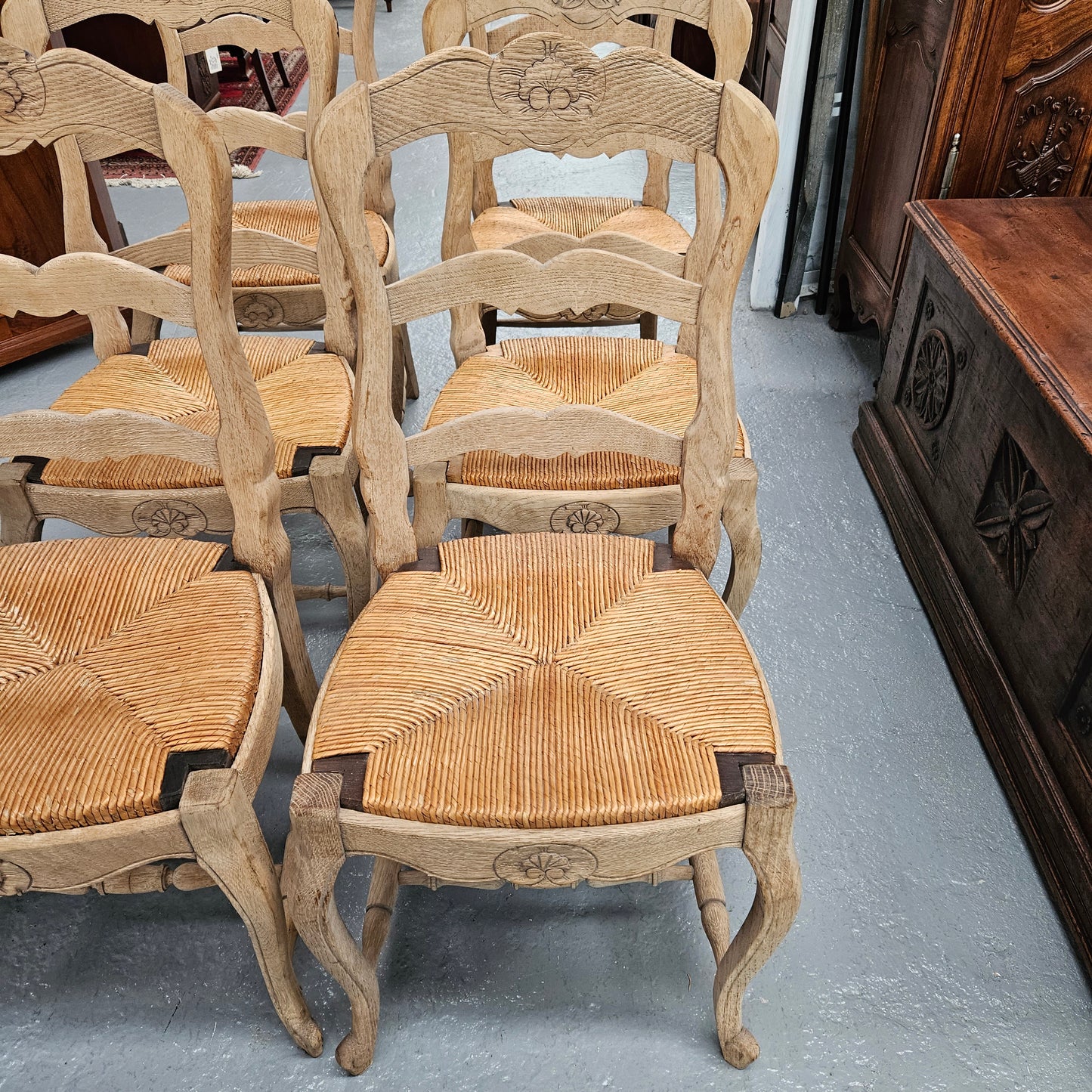 Hard to find set of six striped French Oak rush seat dining chairs. They are in good original detailed condition and have been re-glued. Sourced from France. Please see photos as they form part of the description.