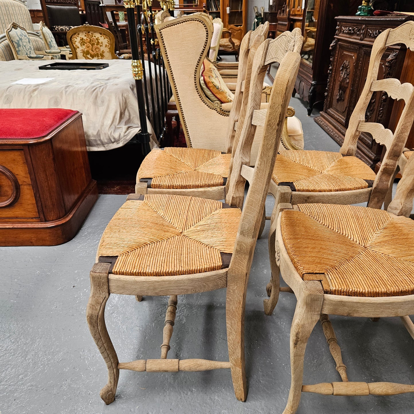 Hard to find set of six striped French Oak rush seat dining chairs. They are in good original detailed condition and have been re-glued. Sourced from France. Please see photos as they form part of the description.