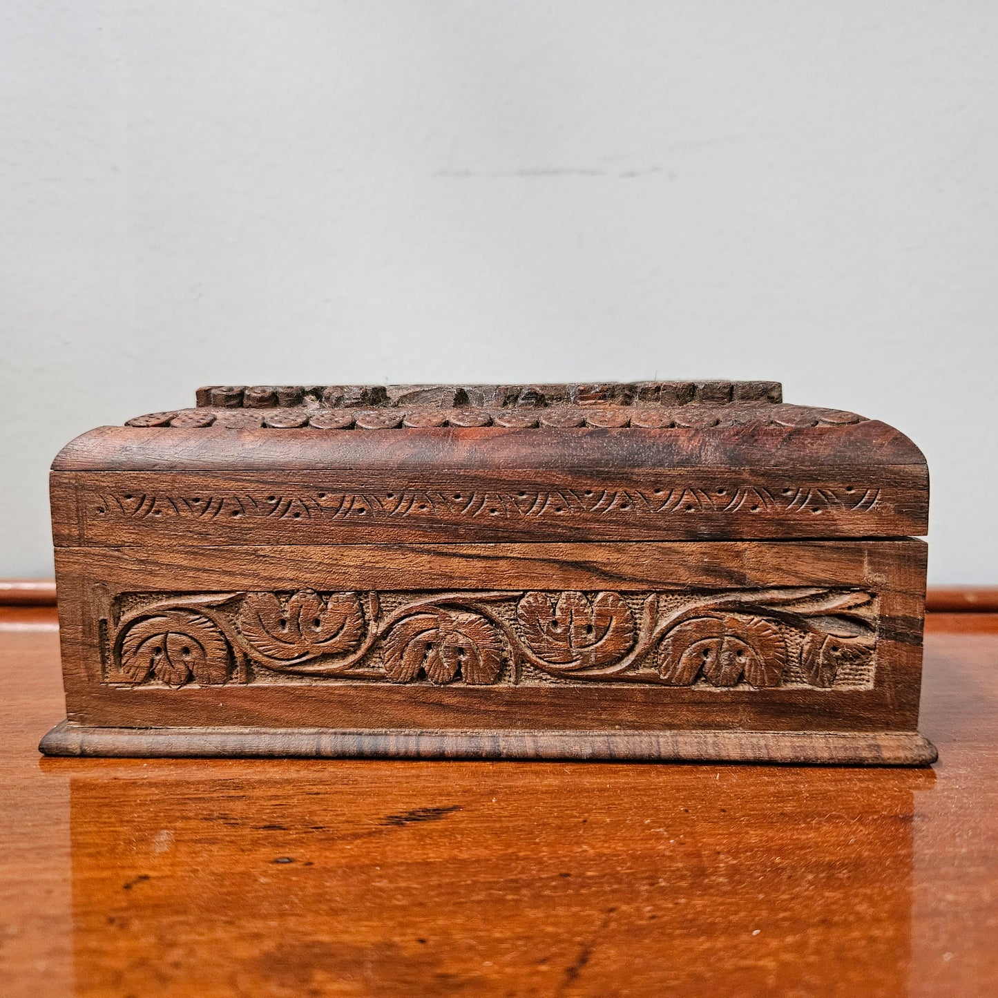 Antique hand carved trinket/ jewellery box. In good original condition, please view photos as they help form part of the description.