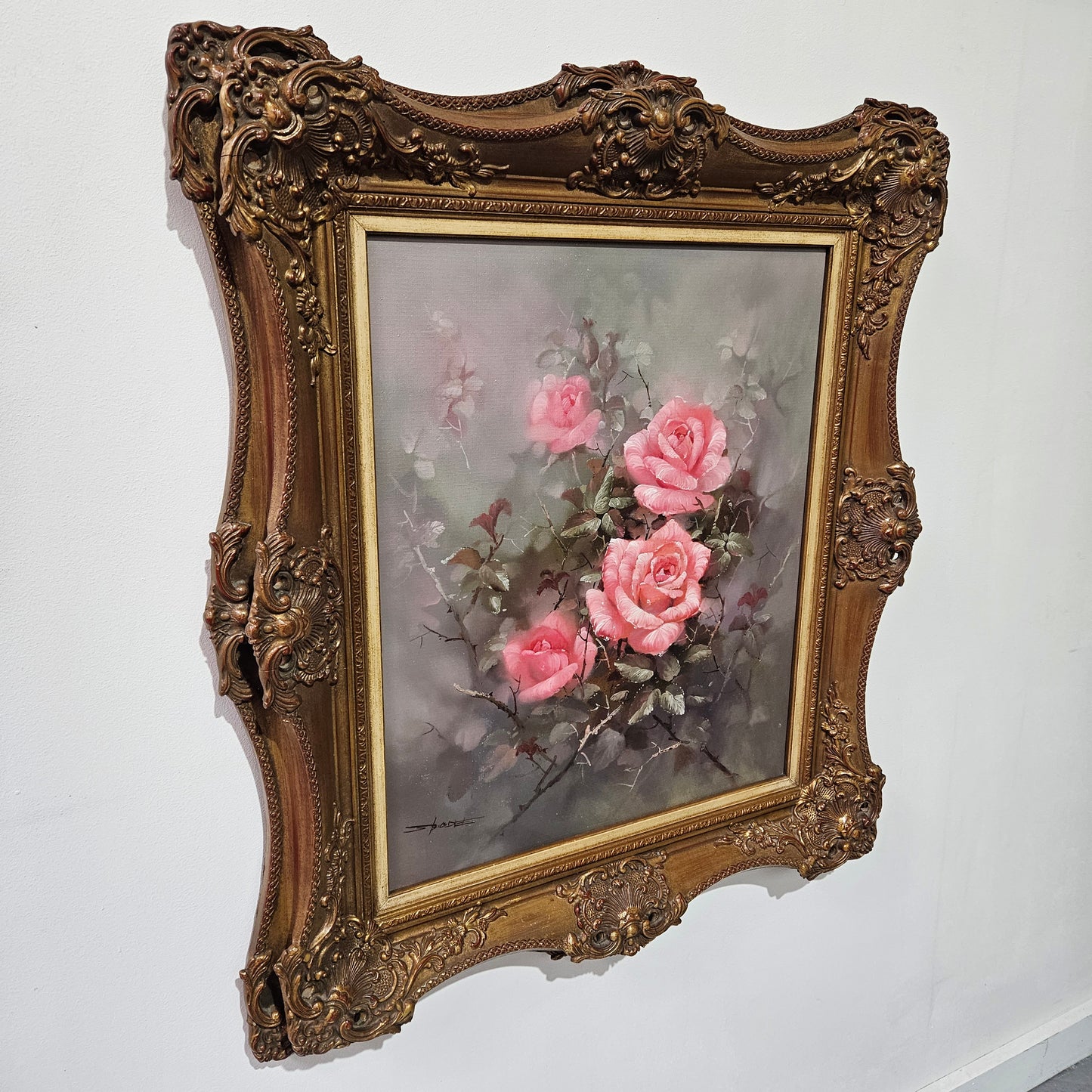 Sourced from France a stunning signed oil on canvas still life of pink roses. In its original frame and in good original detailed condition.
