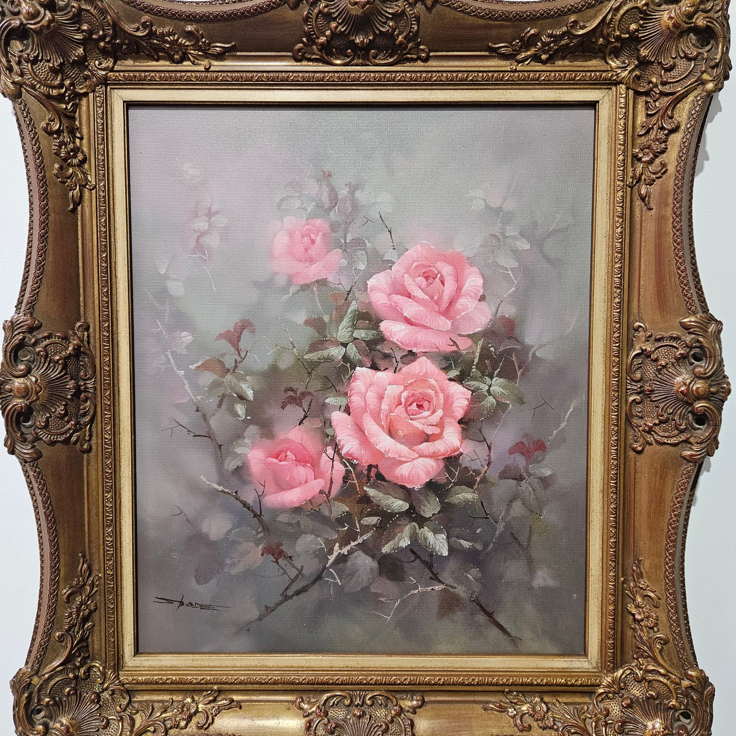 Sourced from France a stunning signed oil on canvas still life of pink roses. In its original frame and in good original detailed condition.