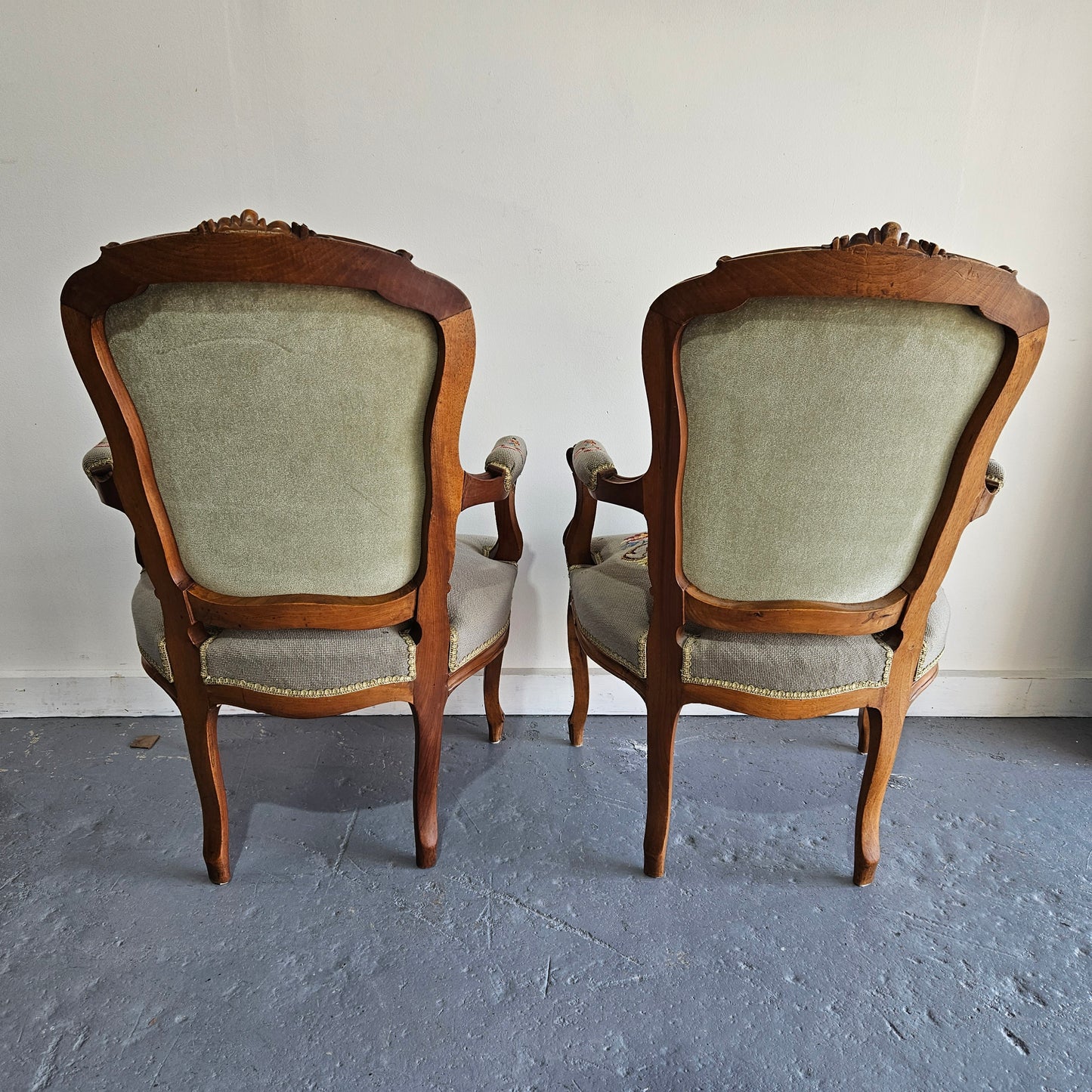 Beautiful pair of Louis XV carved walnut tapestry upholstered armchairs. Circa 1930's. In good condition. Please see photos as they form part of the description.