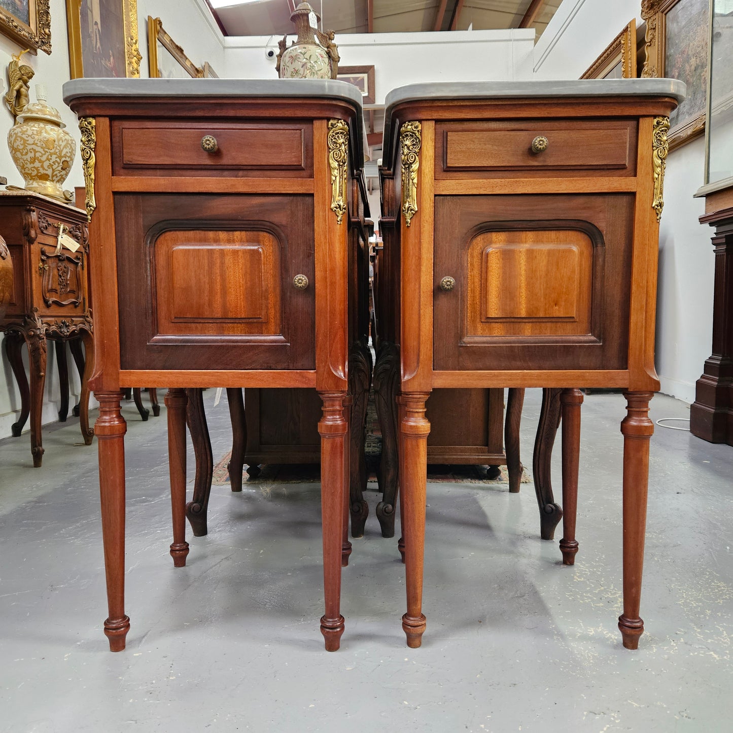 Pair of Mahogany Louis XVI Style Marble Top Bedside Cabinets