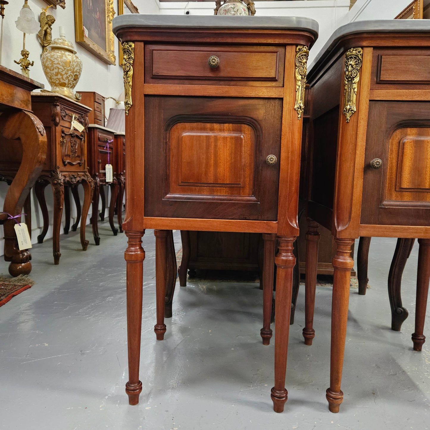 Pair of Mahogany Louis XVI Style Marble Top Bedside Cabinets