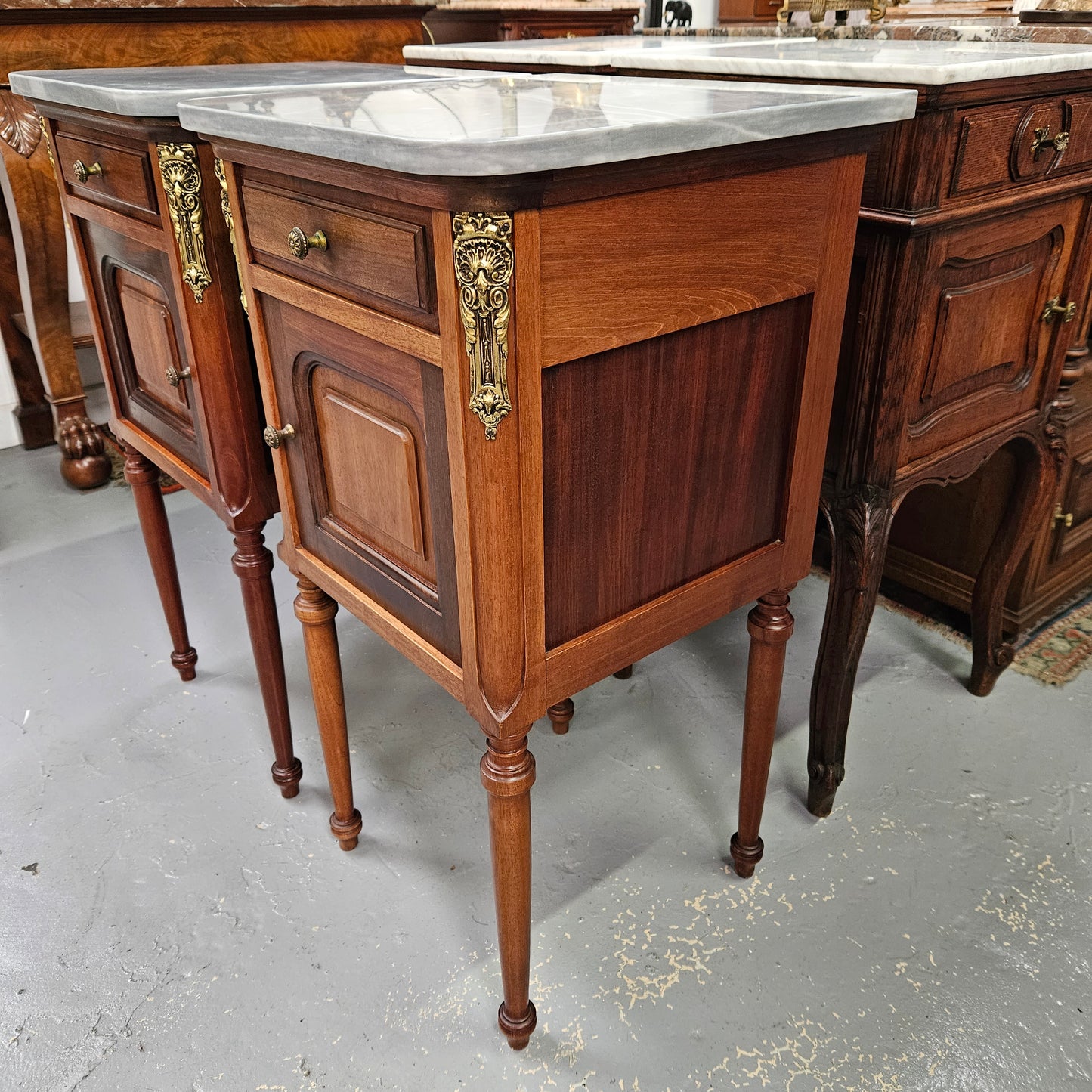 Pair of Mahogany Louis XVI Style Marble Top Bedside Cabinets