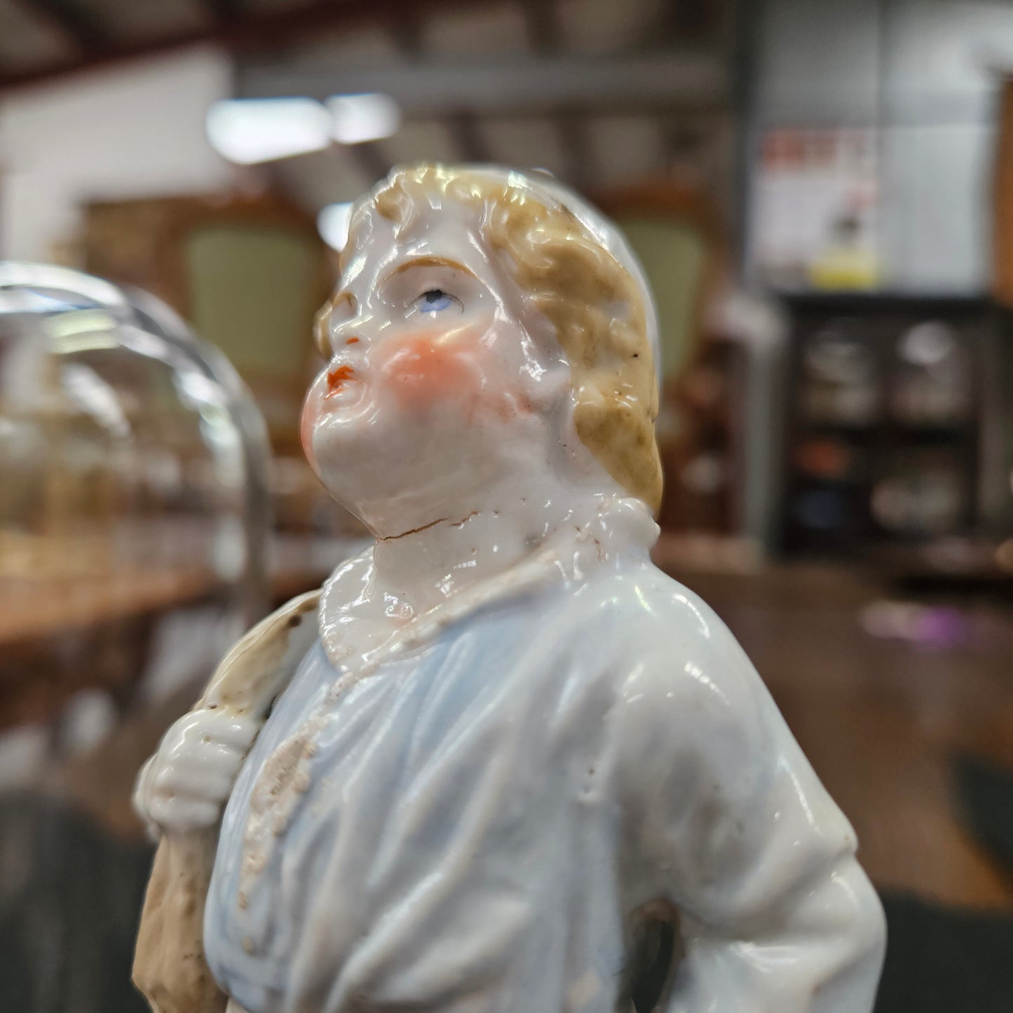 Pair Late Victorian Austrian figures displayed in glass domes