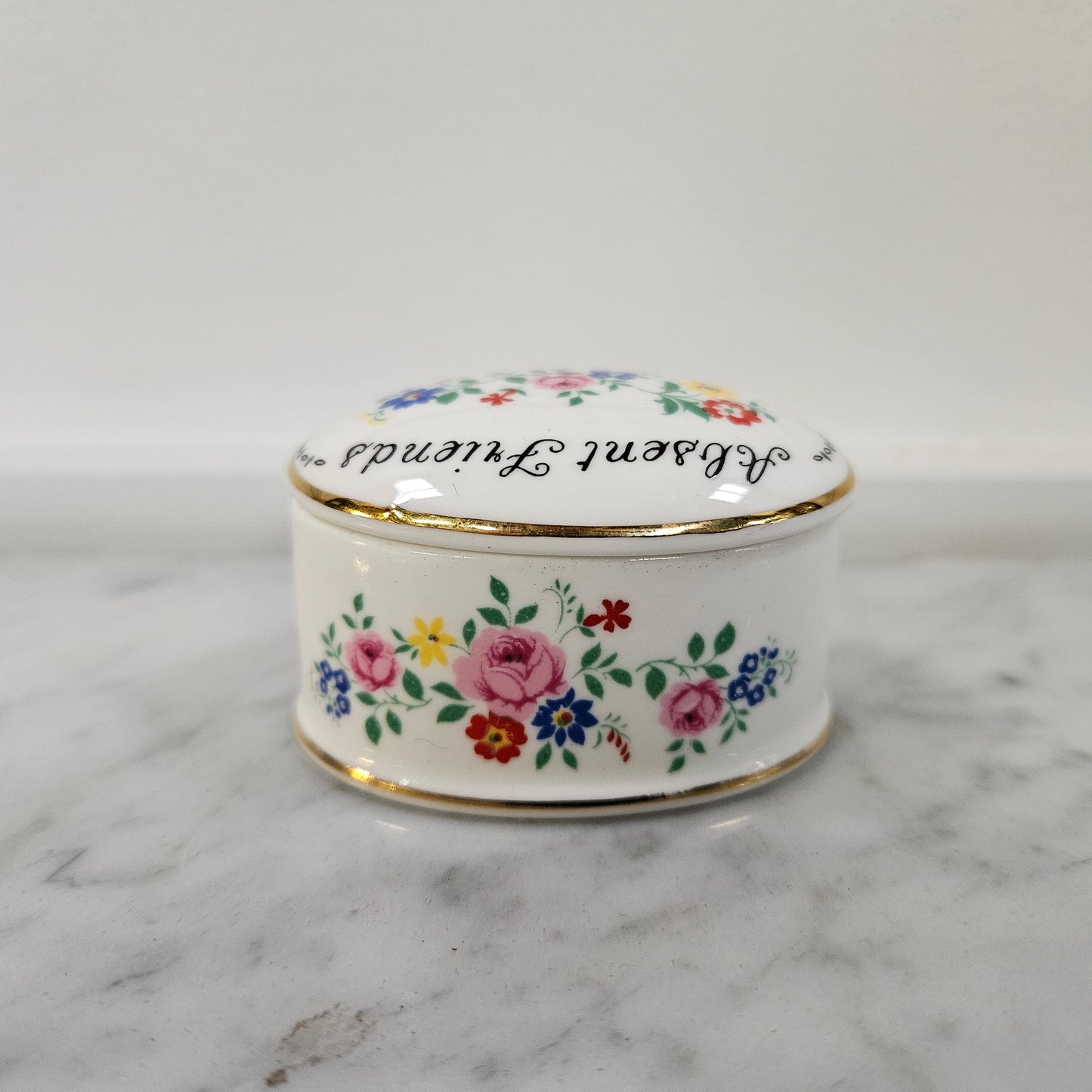 Charming floral lidded trinket box with "Absent Friends Not Forgotten" message. Please see photos as they form part of the description.