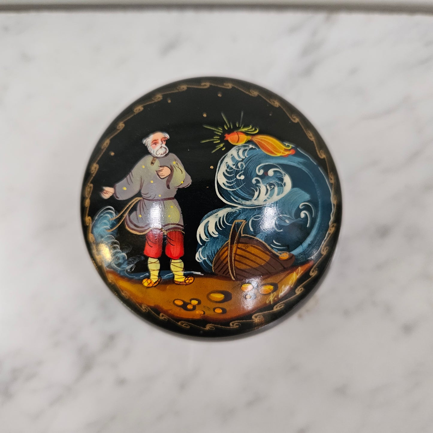 Vintage hand painted Russian trinket box depicting man and boat. In good original condition, please view photos as they help form part of the description.