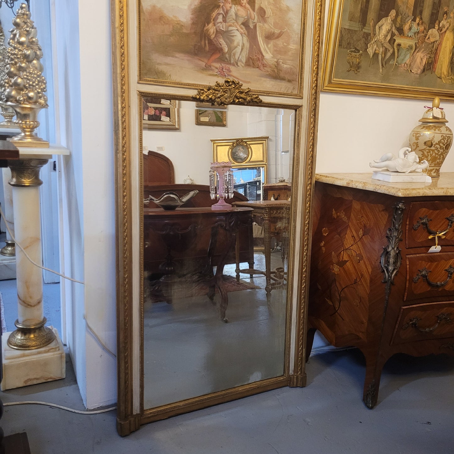 Antique French gilt and hand painted decorative trumeau mirror. It has been sourced directly from France and is in good original condition detailed condition.