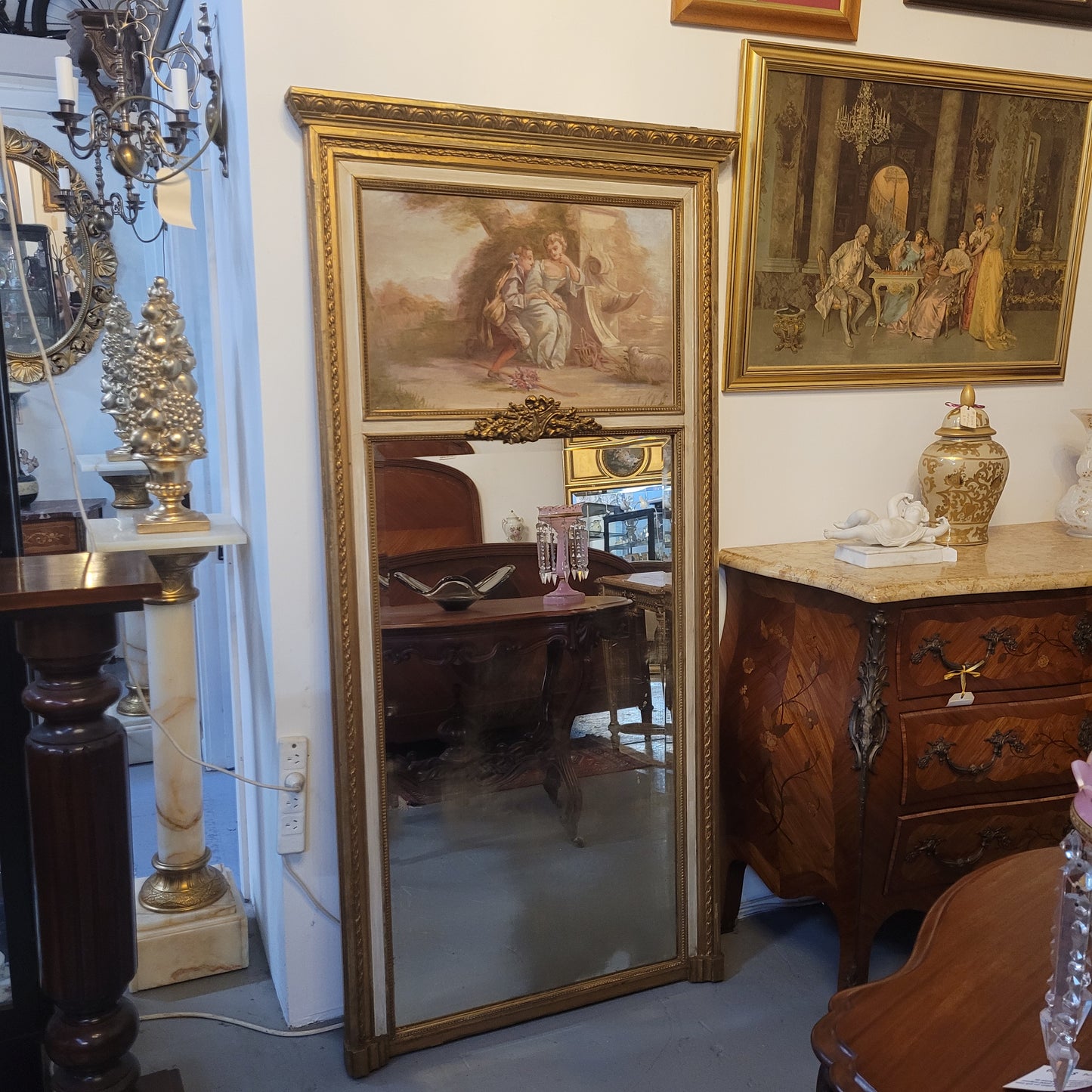 Antique French gilt and hand painted decorative trumeau mirror. It has been sourced directly from France and is in good original condition detailed condition.