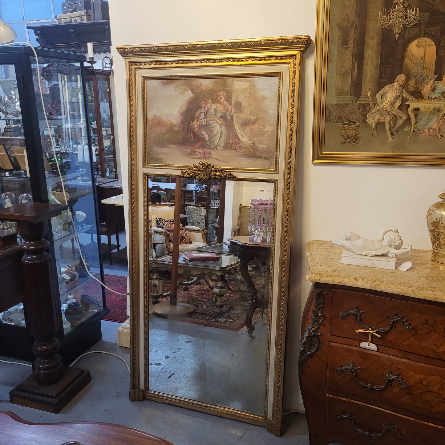 Antique French gilt and hand painted decorative trumeau mirror. It has been sourced directly from France and is in good original condition detailed condition.