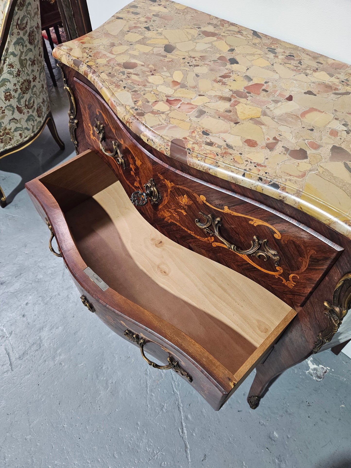 Stunning Antique rosewood three drawer marquetry inlaid marble top commode with ormolu mounts. It is in great original detailed condition. Please see photos as they form part of the description.