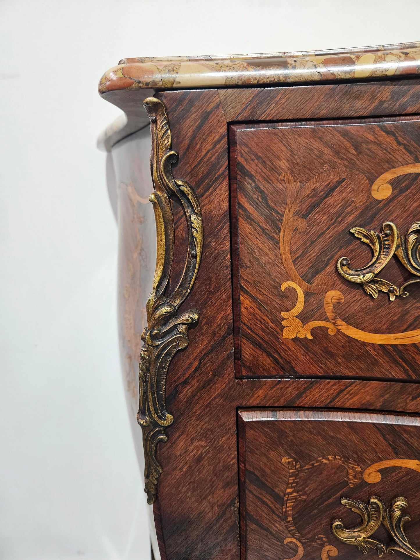 Stunning Antique rosewood three drawer marquetry inlaid marble top commode with ormolu mounts. It is in great original detailed condition. Please see photos as they form part of the description.