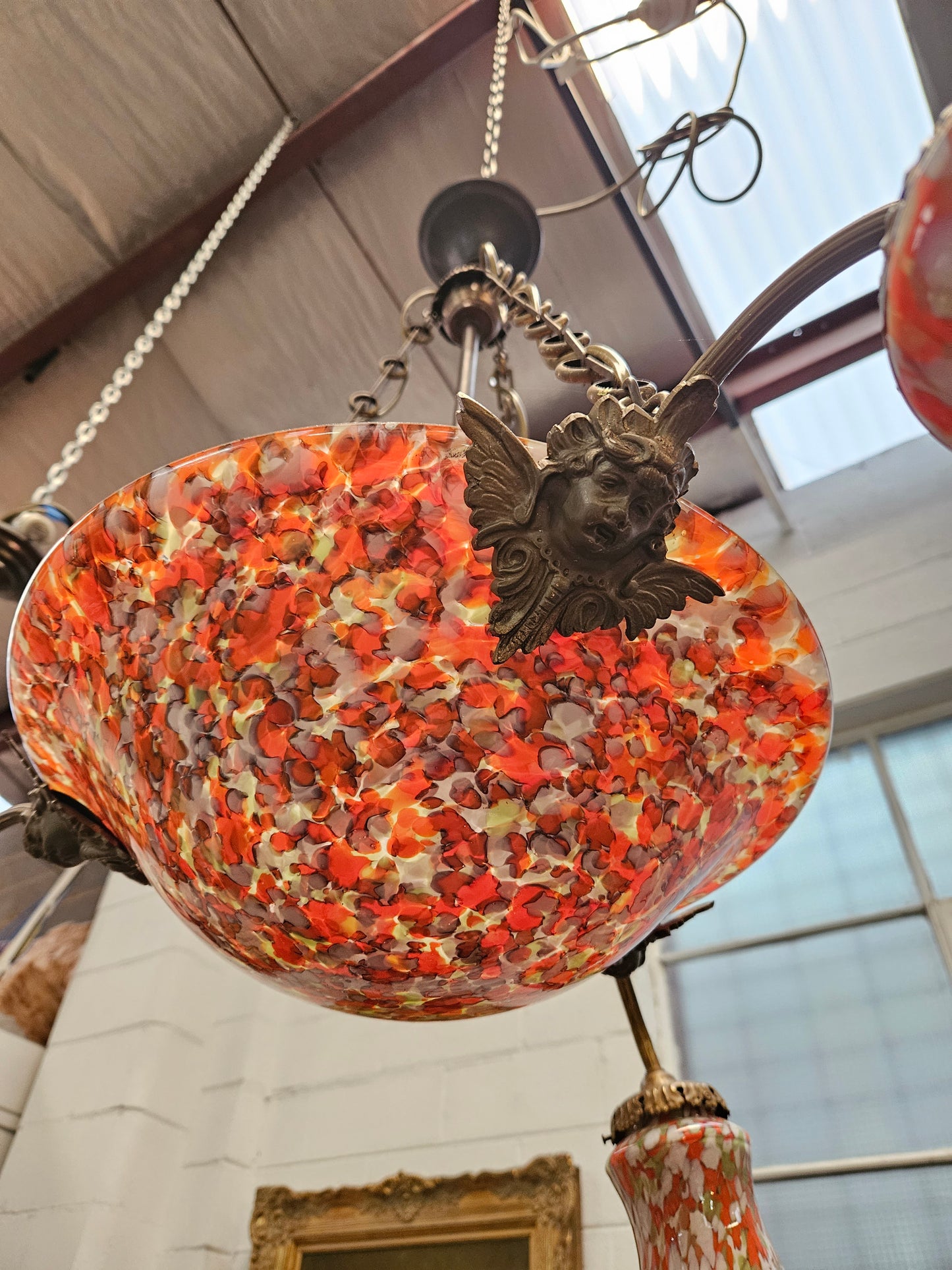 Amazing four light French Art Deco molten glass and brass chandelier with its original shades and bowls. This chandelier has been rewired to Australian standards. It is in good original condition. Please see photos as they form part of the descri