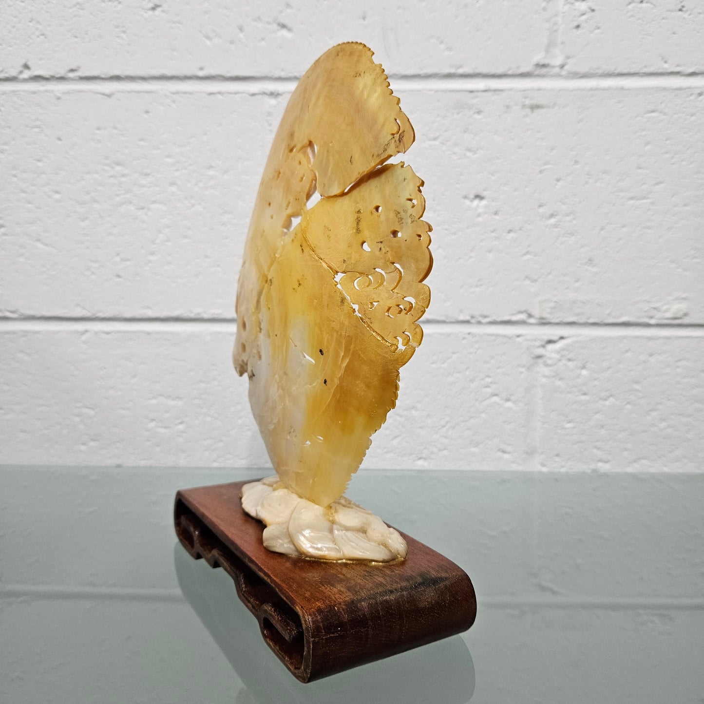 Stunning Dragon Carving on Mother of Pearl. Mounted on Wooden Stand. Please see photos as they form part of the description.