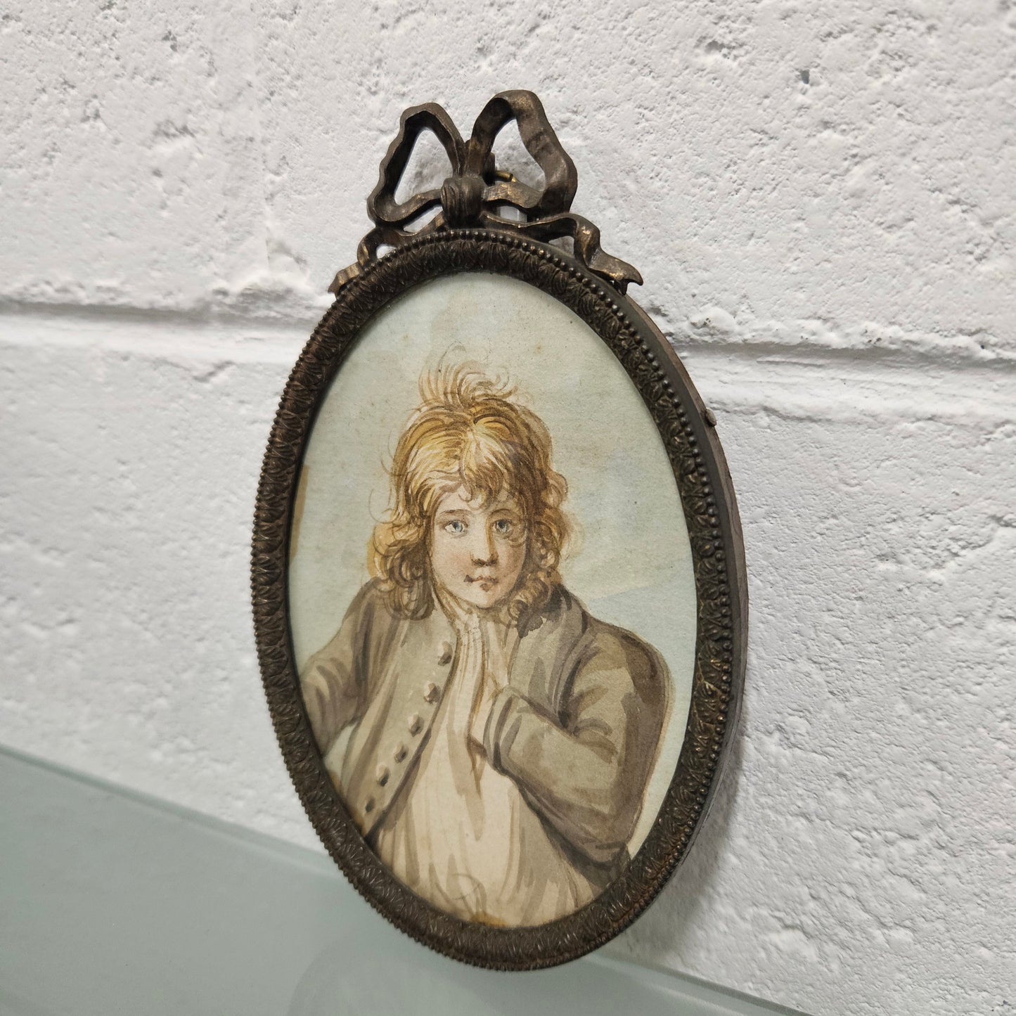 Antique framed miniature water color portrait of young man. Please see photos as they form part of the description.