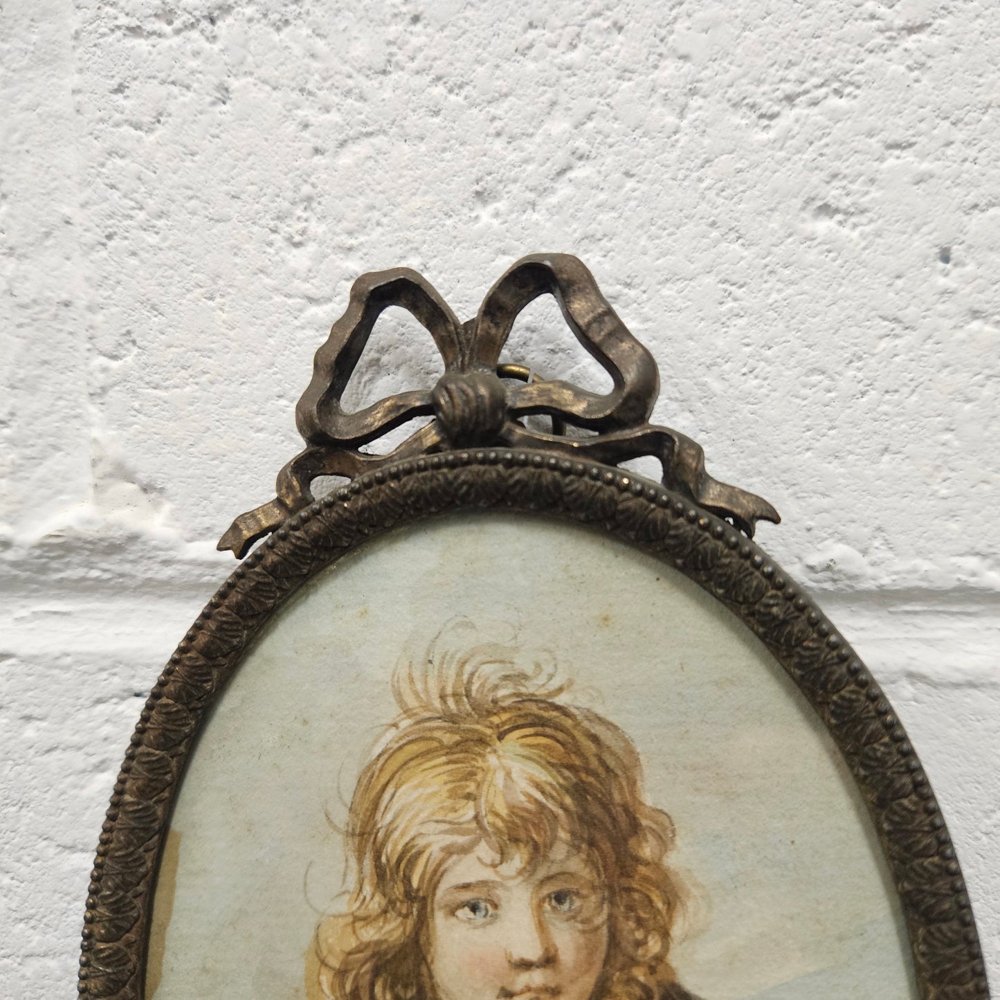 Antique framed miniature water color portrait of young man. Please see photos as they form part of the description.