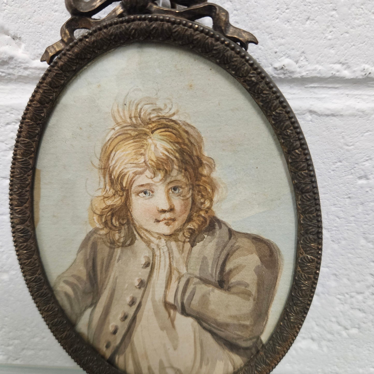 Antique framed miniature water color portrait of young man. Please see photos as they form part of the description.