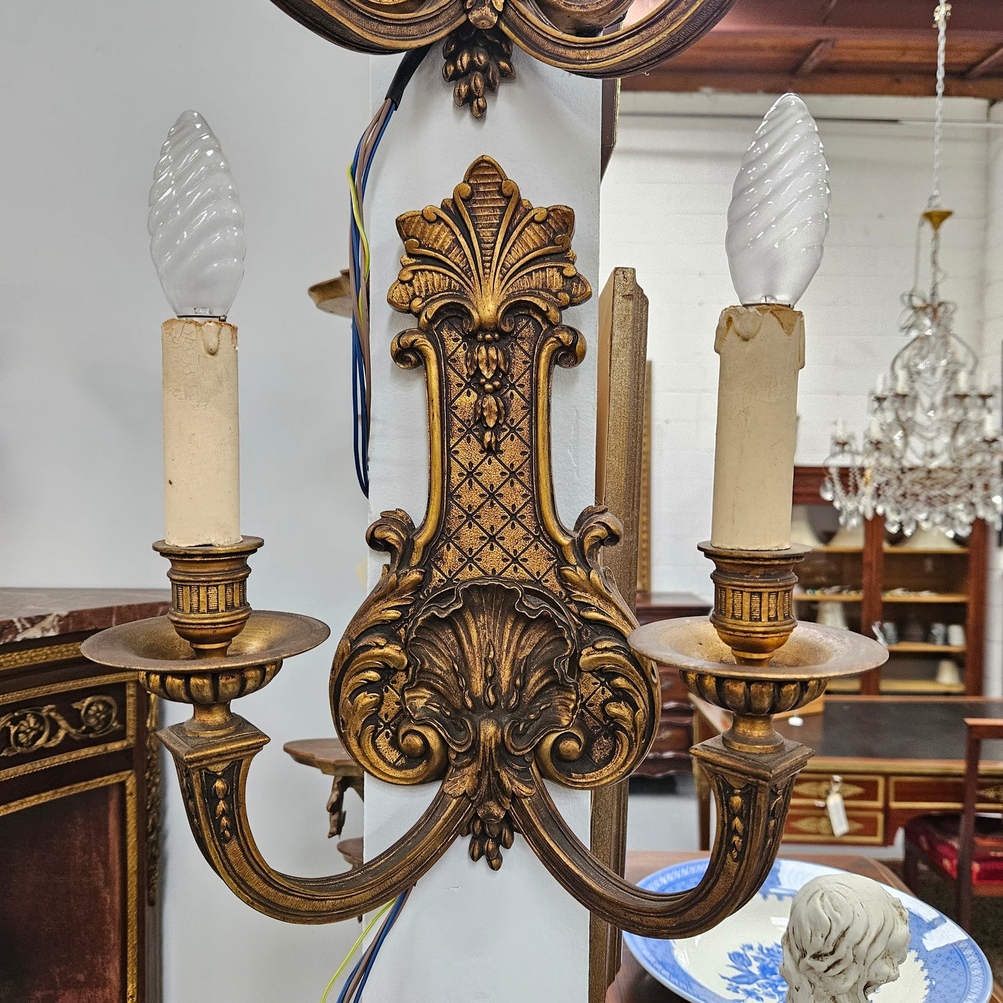Lovely pair of Louis XV style bronze antique wall sconces lights. They are stunning details and have been rewired to Australian standards. These are in excellent original condition. Please view photos as they form part of the description.