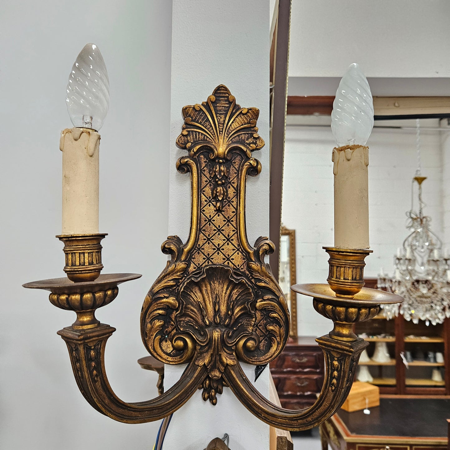 Lovely pair of Louis XV style bronze antique wall sconces lights. They are stunning details and have been rewired to Australian standards. These are in excellent original condition. Please view photos as they form part of the description.