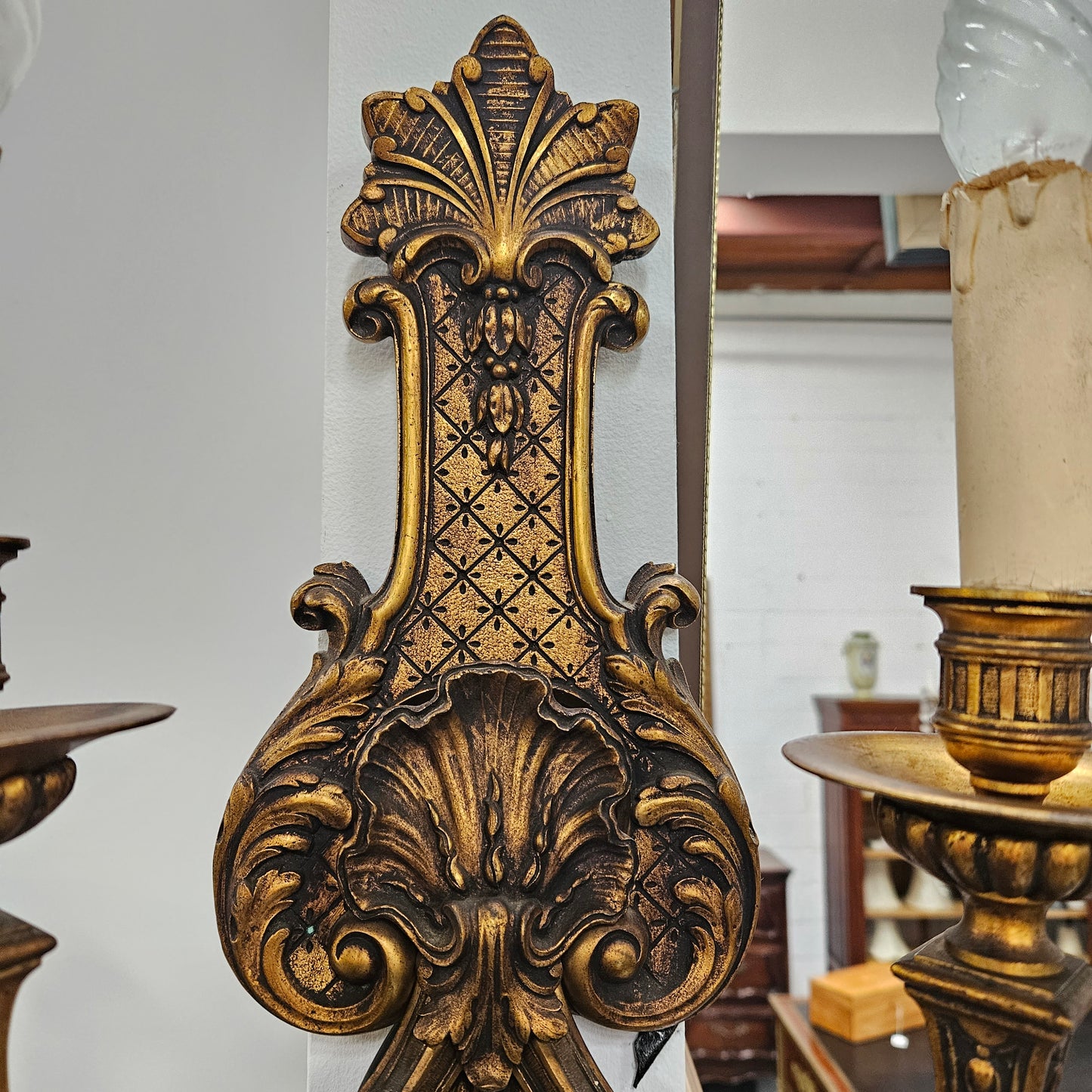 Lovely pair of Louis XV style bronze antique wall sconces lights. They are stunning details and have been rewired to Australian standards. These are in excellent original condition. Please view photos as they form part of the description.