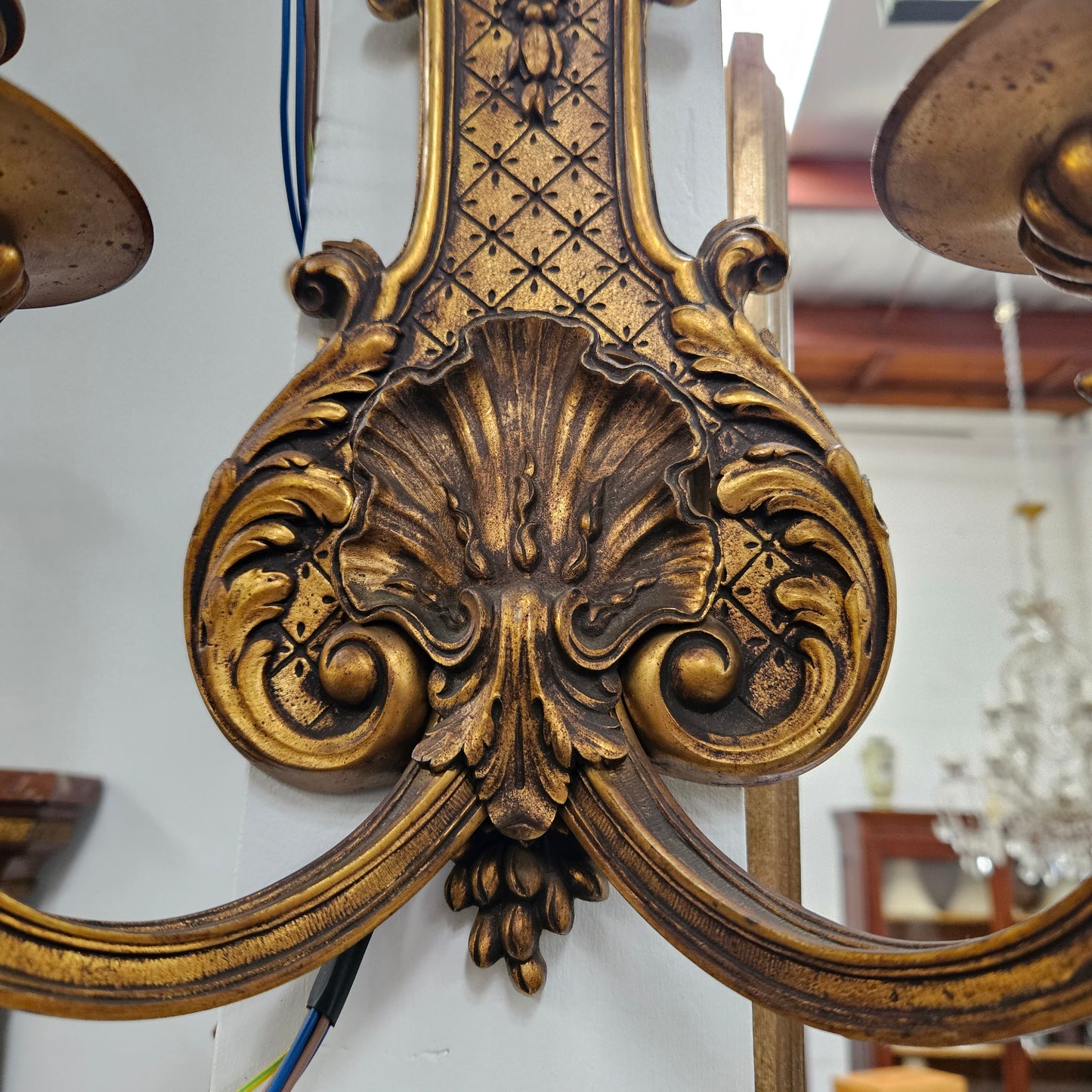 Lovely pair of Louis XV style bronze antique wall sconces lights. They are stunning details and have been rewired to Australian standards. These are in excellent original condition. Please view photos as they form part of the description.