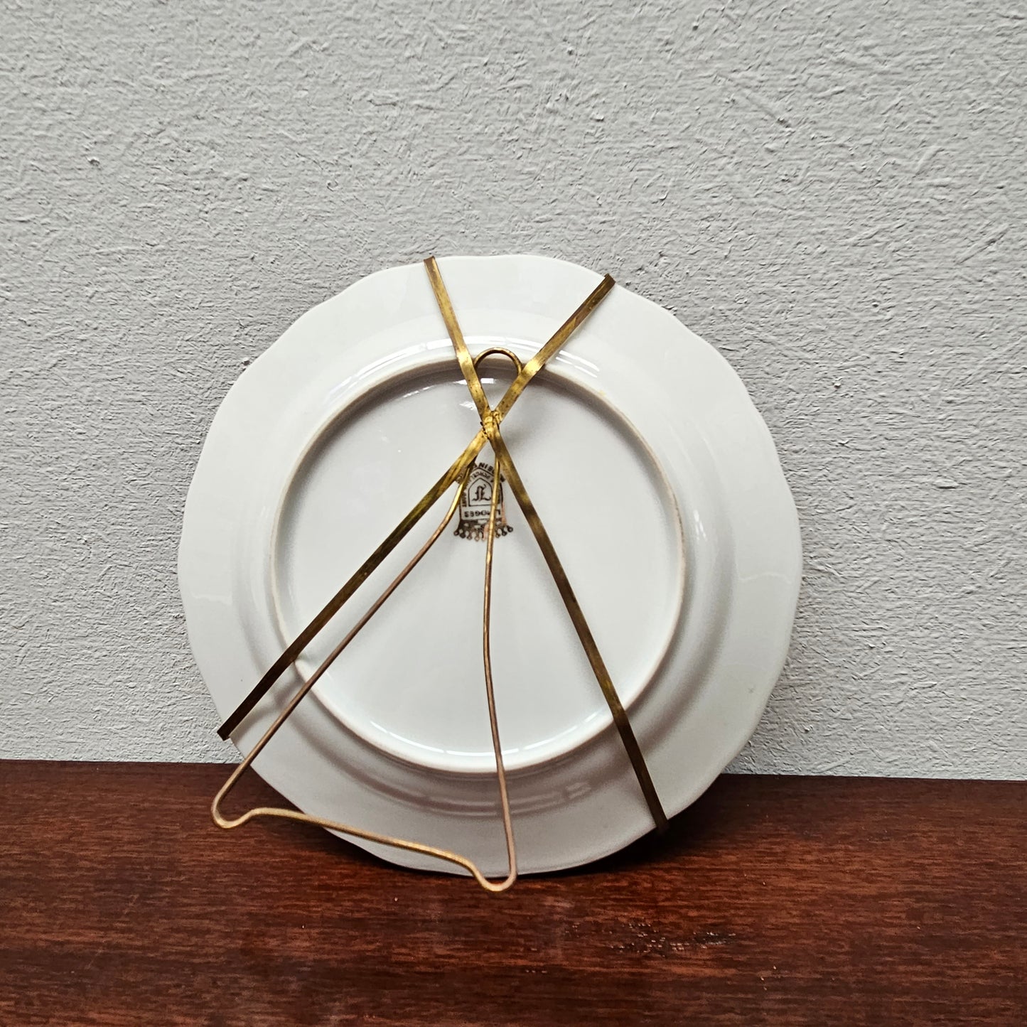 Decorative Limoges plate with stand stamped to rear and made in a France. Sourced locally and in good original condition. Please view photos as they help form part of the description.