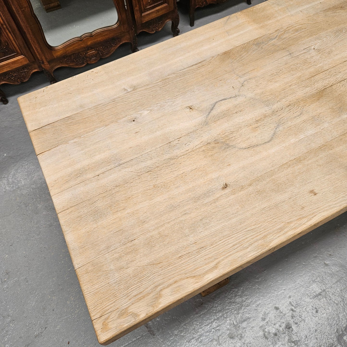 Sourced from France a raw French Oak pedestal dining table. This stunning table features raw oak timber that could be used as is for a distressed look, or finished and waxed for a more refined look. It is in good solid original condition.