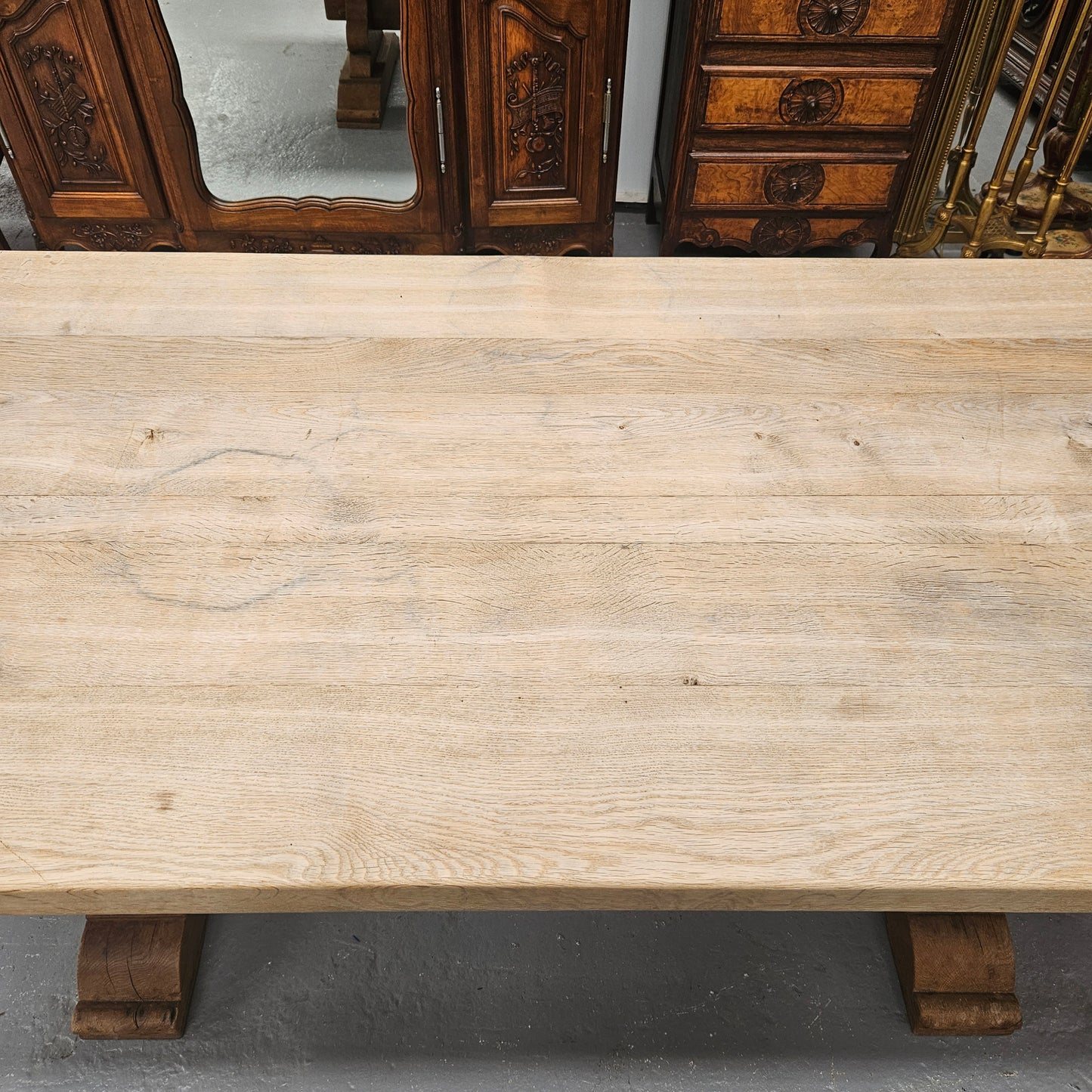 Sourced from France a raw French Oak pedestal dining table. This stunning table features raw oak timber that could be used as is for a distressed look, or finished and waxed for a more refined look. It is in good solid original condition.