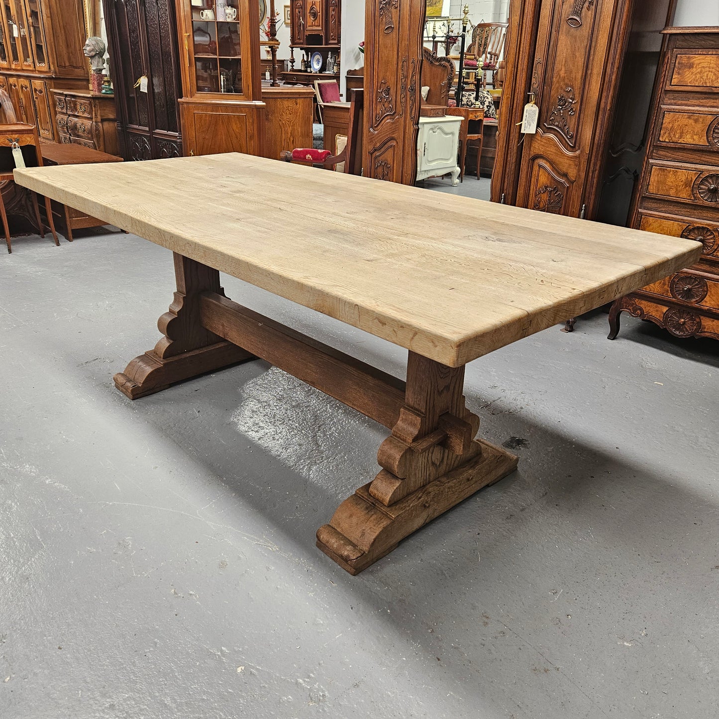 Sourced from France a raw French Oak pedestal dining table. This stunning table features raw oak timber that could be used as is for a distressed look, or finished and waxed for a more refined look. It is in good solid original condition.