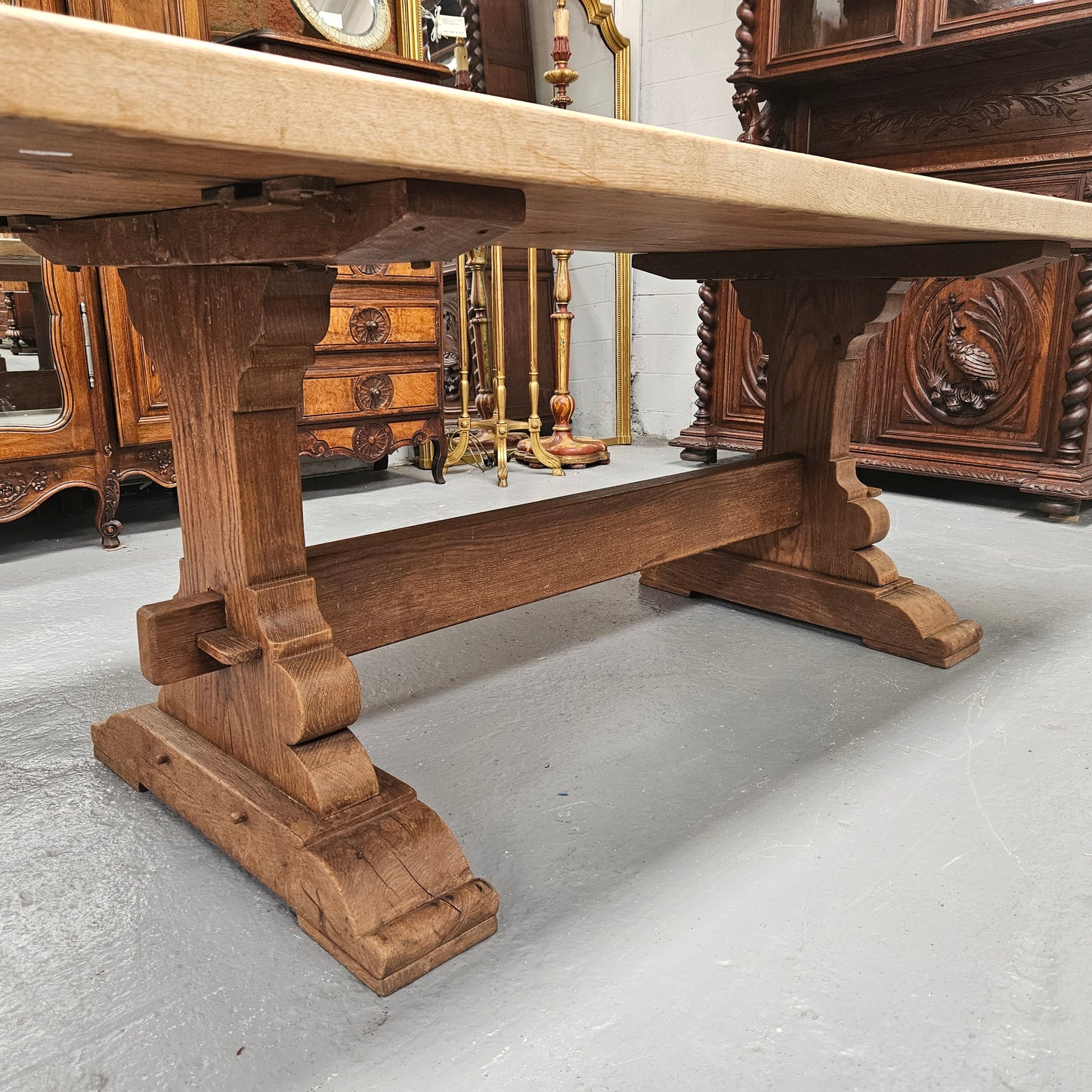 Sourced from France a raw French Oak pedestal dining table. This stunning table features raw oak timber that could be used as is for a distressed look, or finished and waxed for a more refined look. It is in good solid original condition.