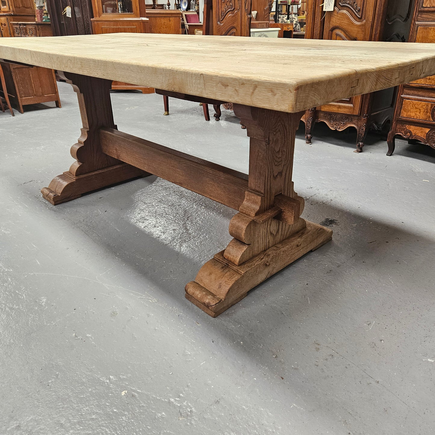 Sourced from France a raw French Oak pedestal dining table. This stunning table features raw oak timber that could be used as is for a distressed look, or finished and waxed for a more refined look. It is in good solid original condition.