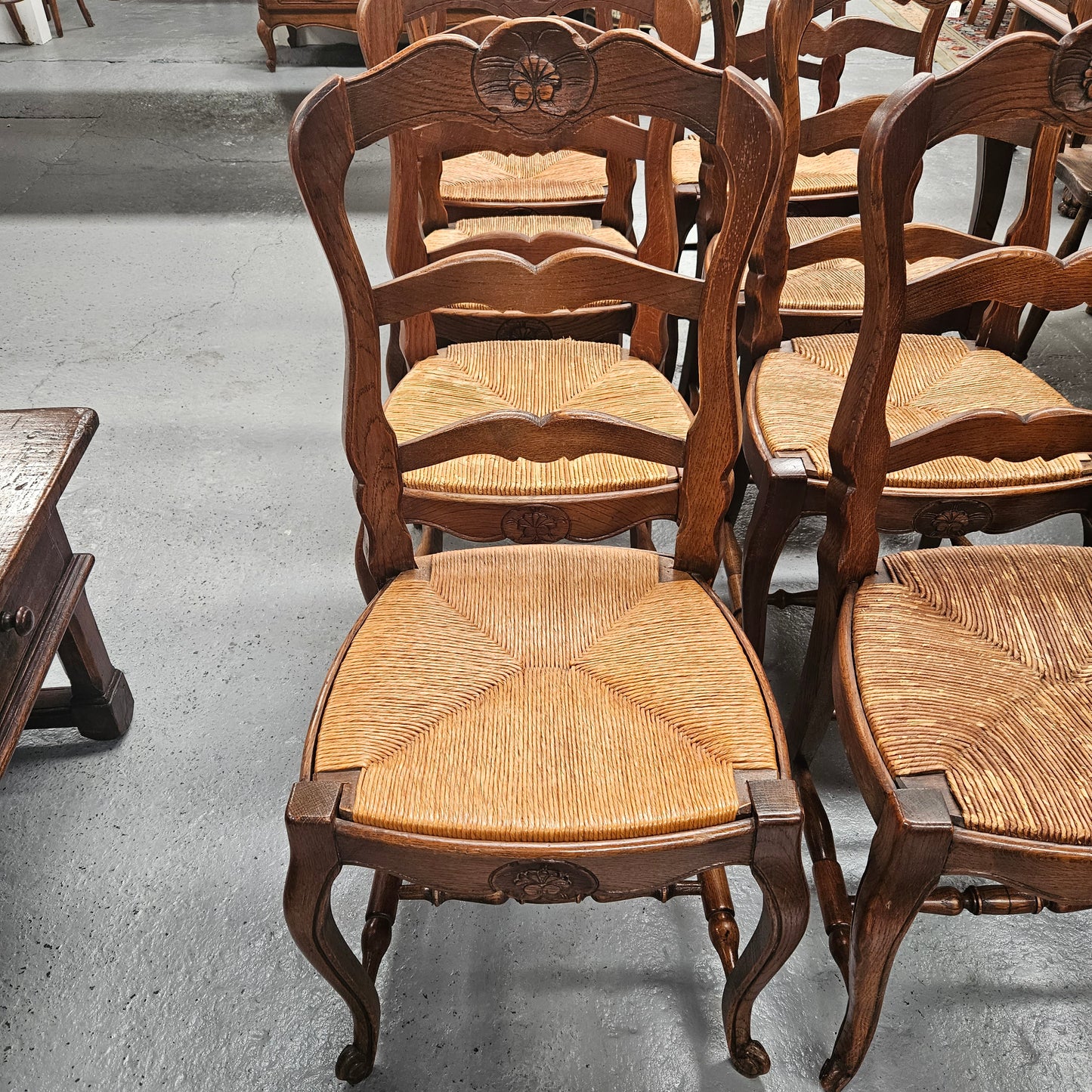 Eight French Oak Rush Seated Dining Chairs