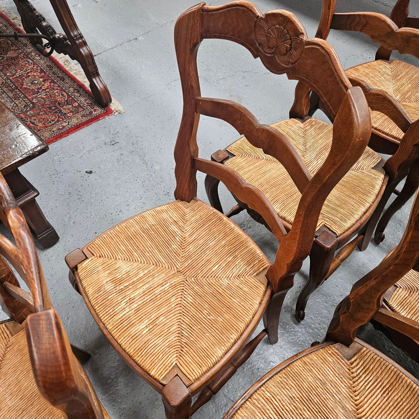 Eight French Oak Rush Seated Dining Chairs