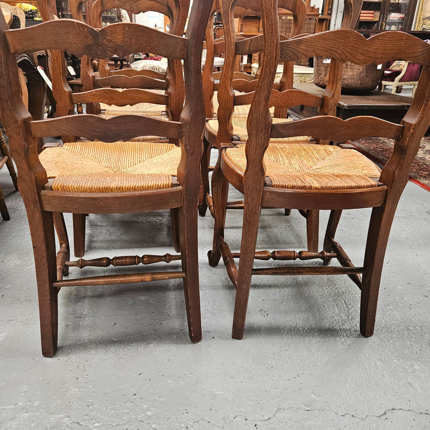 Eight French Oak Rush Seated Dining Chairs