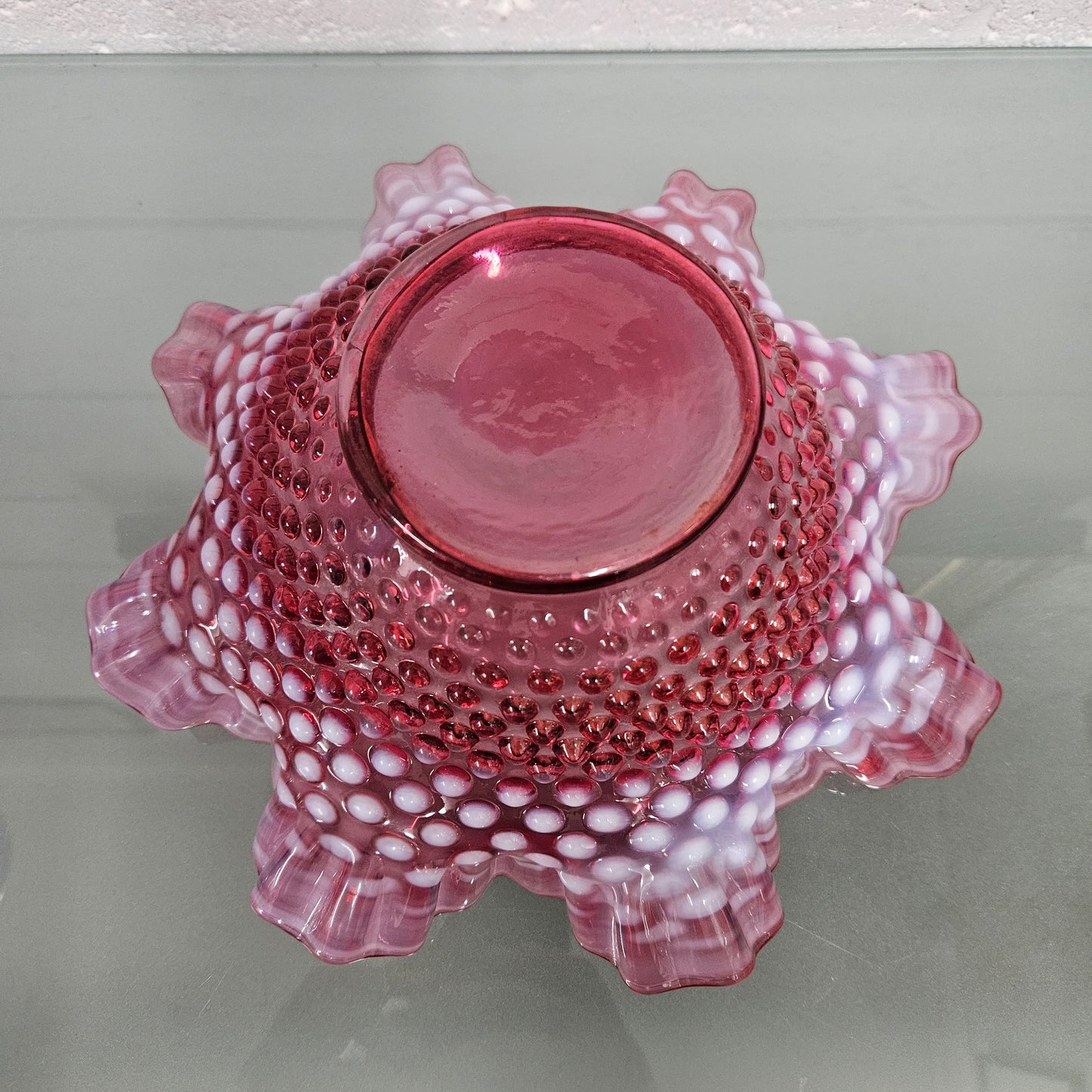 Vintage Large Fenton Cranberry glass bowl with opalescent trim. In good condition. Please see photos as they form part of the description.
