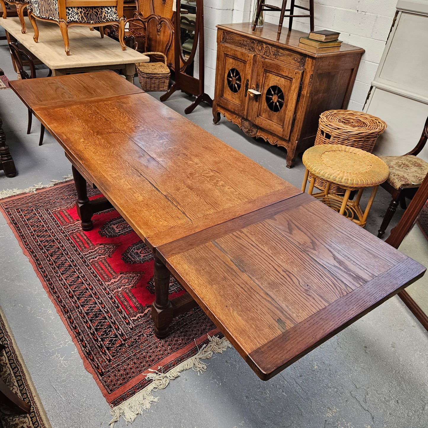 Rare and unique sized French Oak stretcher base extension dining table. Fully extended length is 253 cm, this table is in great original condition. Sourced from France. Please see photos as they form part of the description.