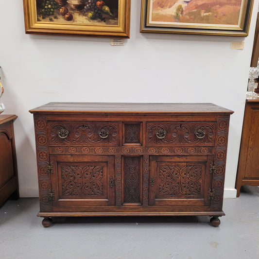 Impressively Carved 18th Century English Oak Kitchen Dresser Base in 17th Century Jacobean Style