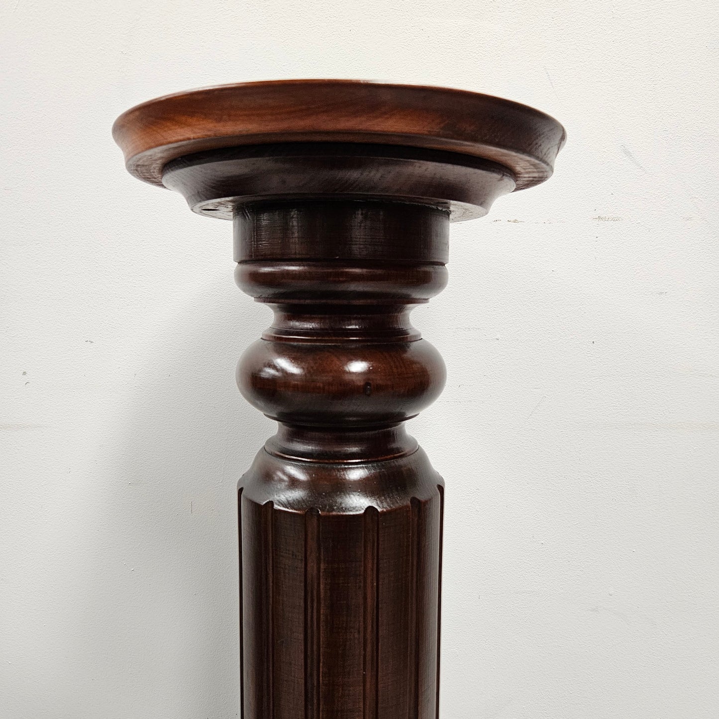 Amazing blackwood gun barrel pedestal with a great design. It is in good original condition. Please see photos as they form part of the description.