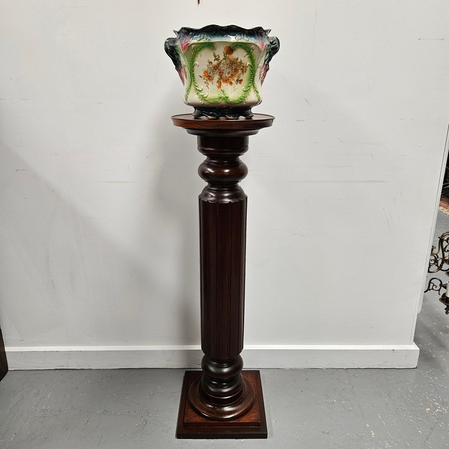 Amazing blackwood gun barrel pedestal with a great design. It is in good original condition. Please see photos as they form part of the description.