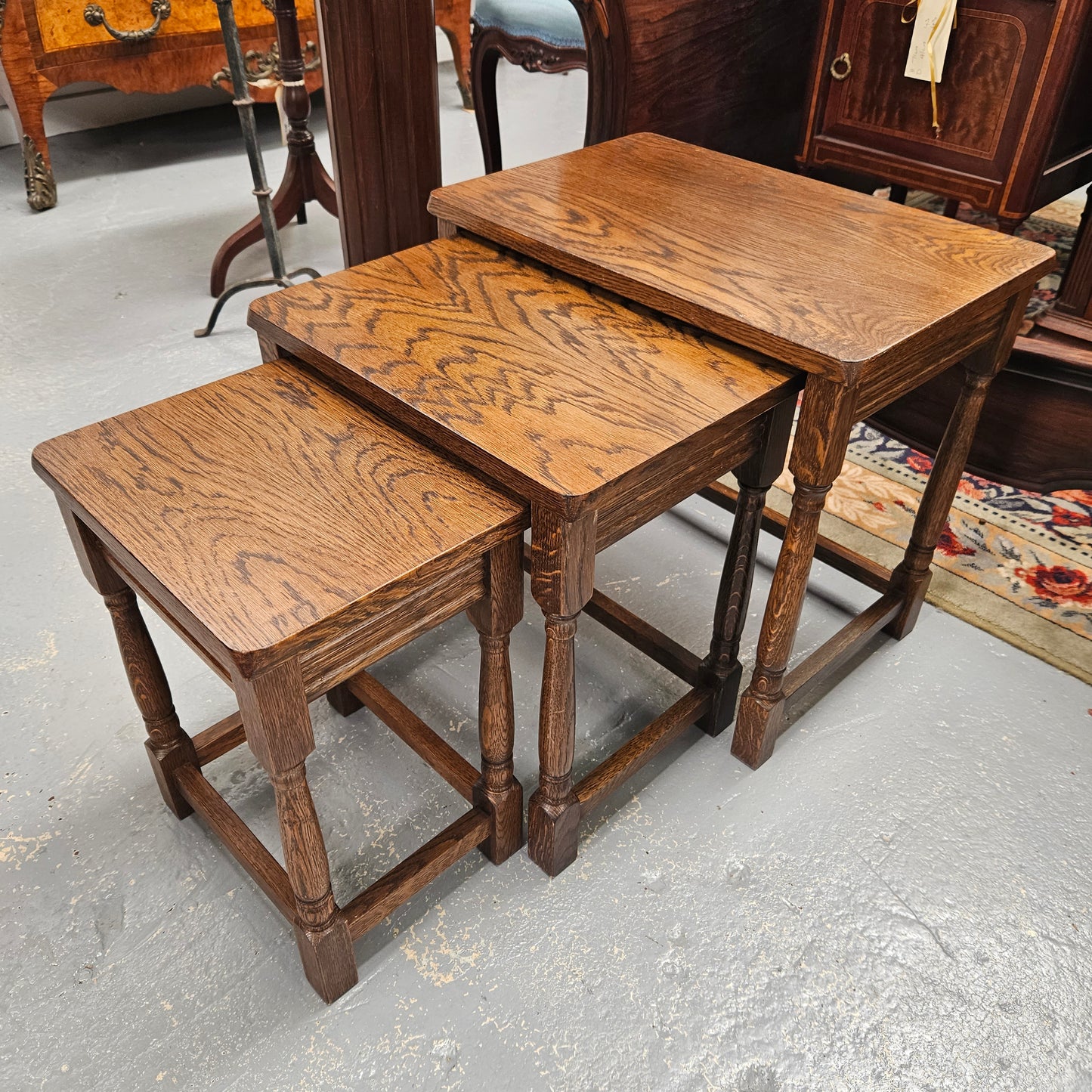 Lovely set of three French Oak nest of tables. They are all in good original condition. Please see photos as they form part of the description.