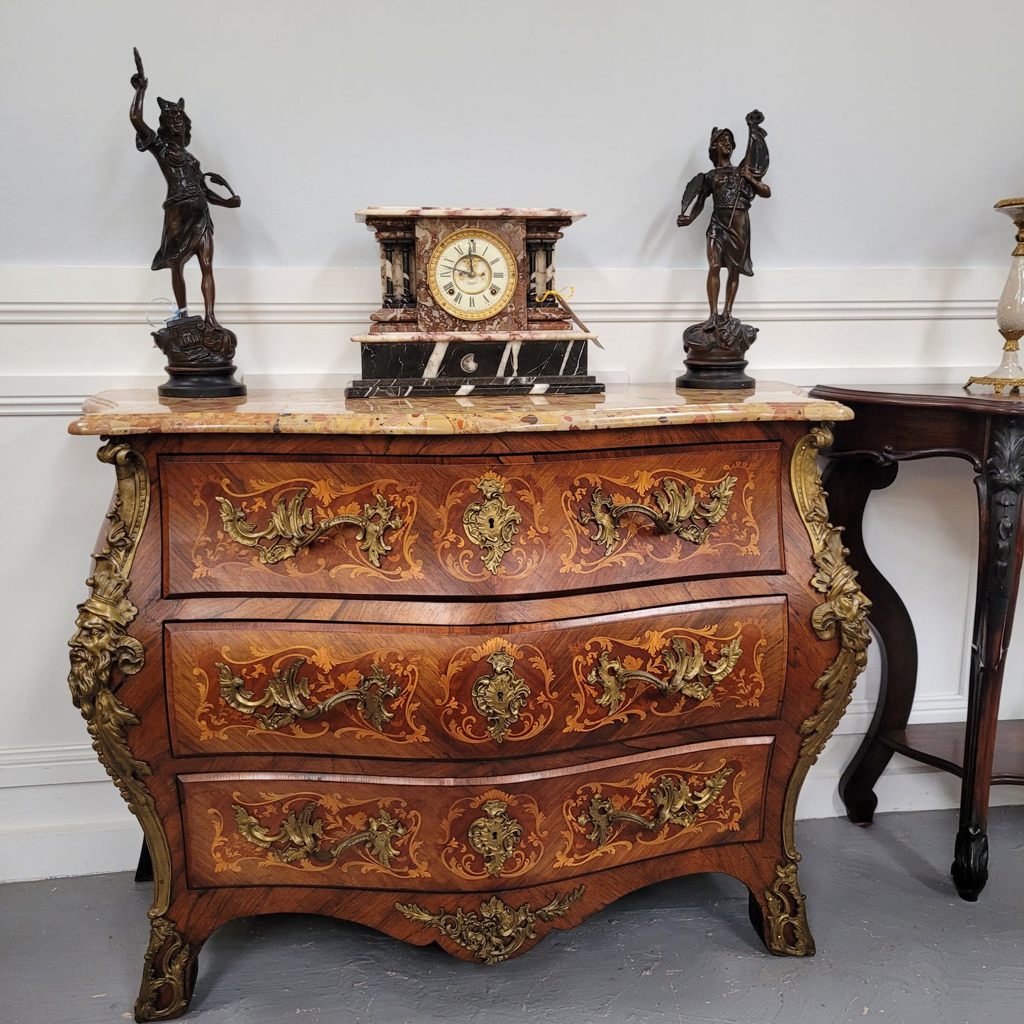 This exceptional 19th Century French Louis XV Kingwood and Rosewood marquetry inlaid marble top bombe shaped commode is an exceptional example of fine craftsmanship. Featuring exquisite decorative marquetry inlay throughout and elegant bronze mounts. It has been sourced from France and is in good original detailed condition.