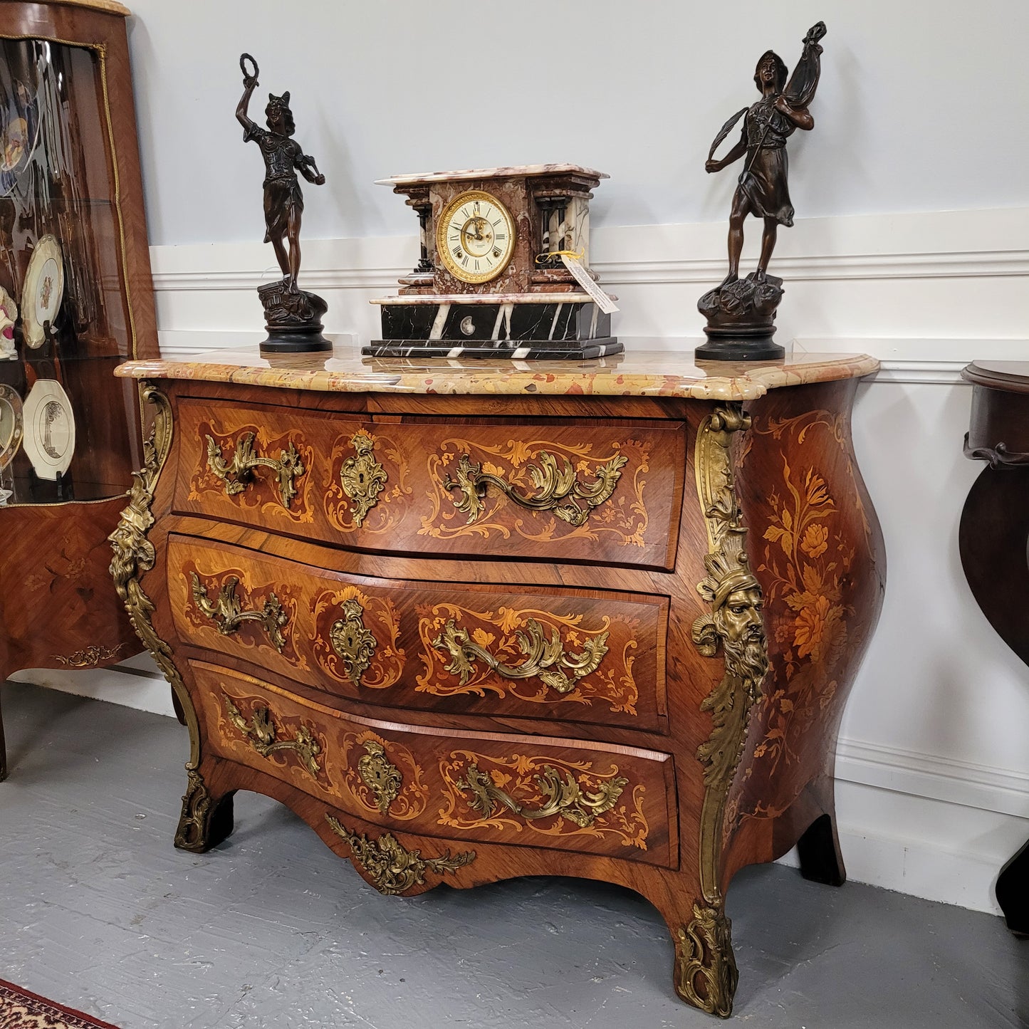 This exceptional 19th Century French Louis XV Kingwood and Rosewood marquetry inlaid marble top bombe shaped commode is an exceptional example of fine craftsmanship. Featuring exquisite decorative marquetry inlay throughout and elegant bronze mounts. It has been sourced from France and is in good original detailed condition.