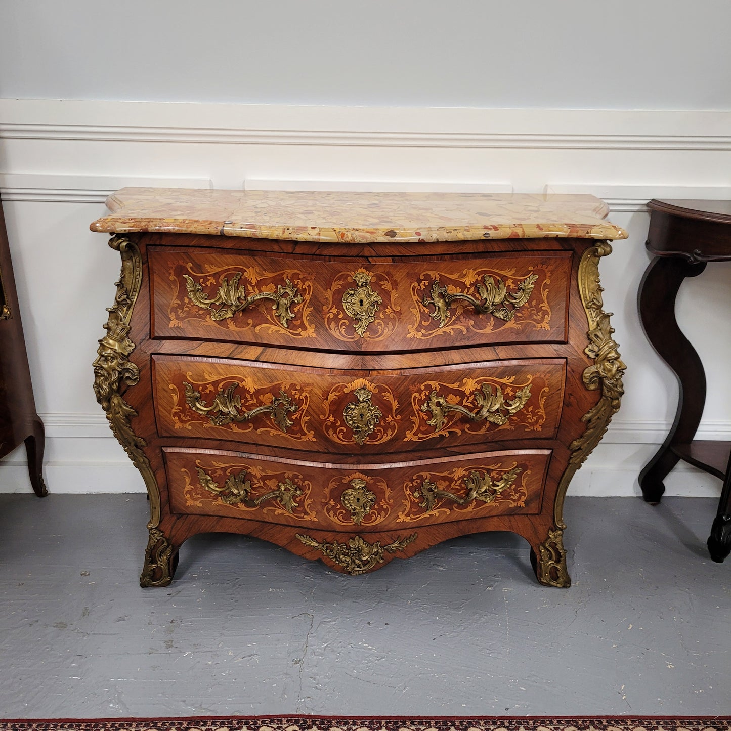 This exceptional 19th Century French Louis XV Kingwood and Rosewood marquetry inlaid marble top bombe shaped commode is an exceptional example of fine craftsmanship. Featuring exquisite decorative marquetry inlay throughout and elegant bronze mounts. It has been sourced from France and is in good original detailed condition.