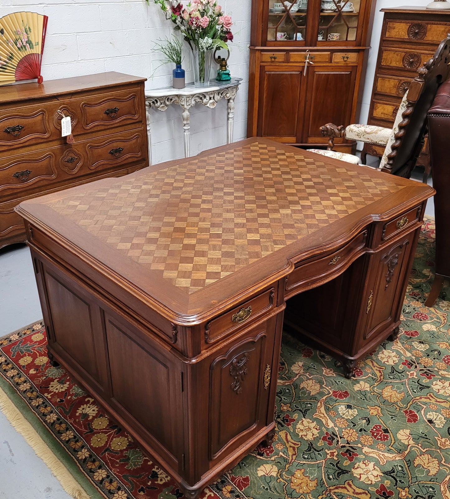 Fabulous French Walnut Louis XV style partners desk with a parquetry top and plenty of storage space. In good original detailed condition and has be