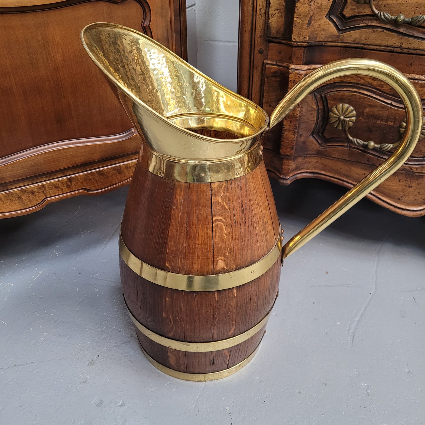 Stunning French Oak and brass jug which could be used as an umbrella stand. It has been sourced from France and is in good original detailed condition. Circa 1950's.