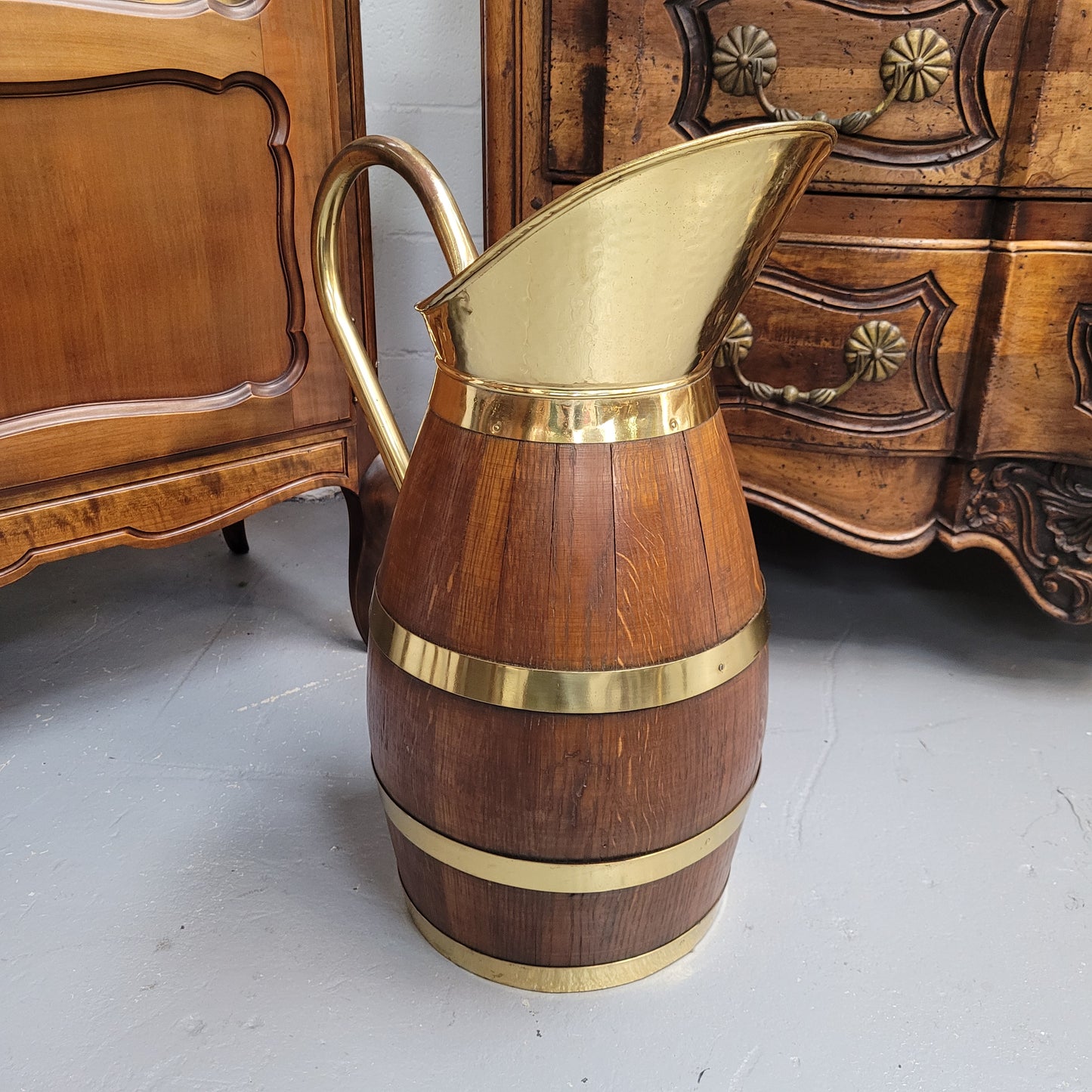 Stunning French Oak and brass jug which could be used as an umbrella stand. It has been sourced from France and is in good original detailed condition. Circa 1950's.